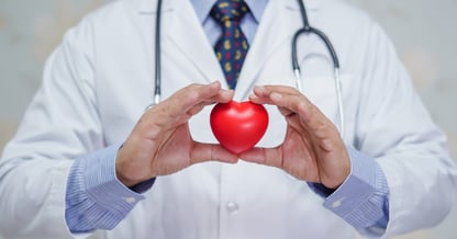 Doctor holding a heart 